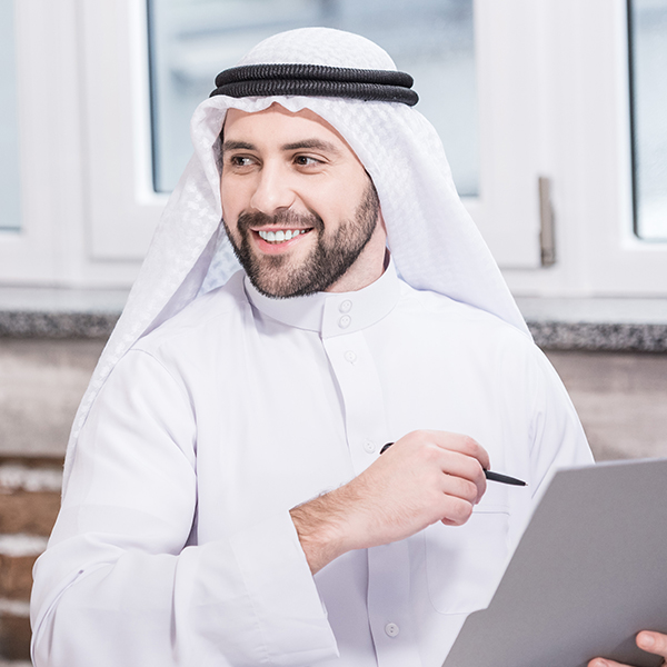 arabian businessman holding folder and pen in offi QCQVV9Ca.jpg